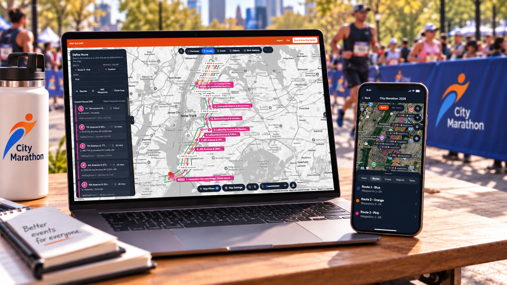 A laptop showing three marathon routes in the MOOV Map Builder, beside a phone showing the same event's routes, at a city marathon
